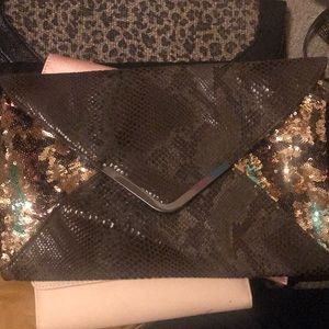 Brown snakeskin clutch